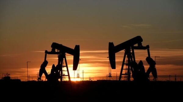 Pump jacks operate at sunset in an oil field in Midland, Texas U.S. August 22, 2018. REUTERS/Nick Oxford