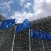 European Union flags flutter outside the European Commission headquarters in Brussels, Belgium, June 5, 2020. REUTERS/Yves Herman/File Photo