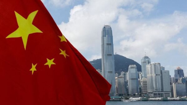 Flag of china infront of a city