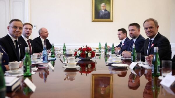 Polish President Andrzej Duda (L) meets with leaders of Civic Coalition Donald Tusk, Adam Szlapka and Marcin Kierwinski during consultations with leaders of the two main parties; Law and Justice and Civic Platform, in the newly elected parliament, at the Presidential Palace in Warsaw, Poland, October 24, 2023. REUTERS/Kacper Pempel/File Photo