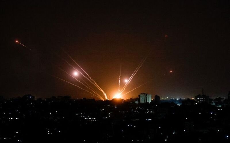 Rockets are fired from Gaza towards Israel, in Gaza October 9, 2023. REUTERS/Mohammed Salem/File Photo