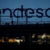 The logo of Spanish power company Endesa tops it headquarters in Madrid, Spain, April 27, 2022. REUTERS/Susana Vera/File Photo