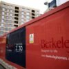 Hoardings display a logo of Berkeley Group outside a development in London, Britain, March 4, 2023. REUTERS/Henry Nicholls/File Photo