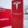 A IF metall tent stands next to a Tesla sign as workers picket outside of a Tesla service centre in Upplands Vasby, north of Stockholm, Sweden December 15, 2023. REUTERS/Marie Mannes